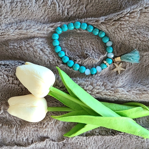 Guess Jewelry - ⭐ 2/$10 or 3/$15 - Guess Aqua Beaded Bracelet with Starfish Charm